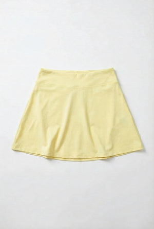 Yellow skirt on a light gray background