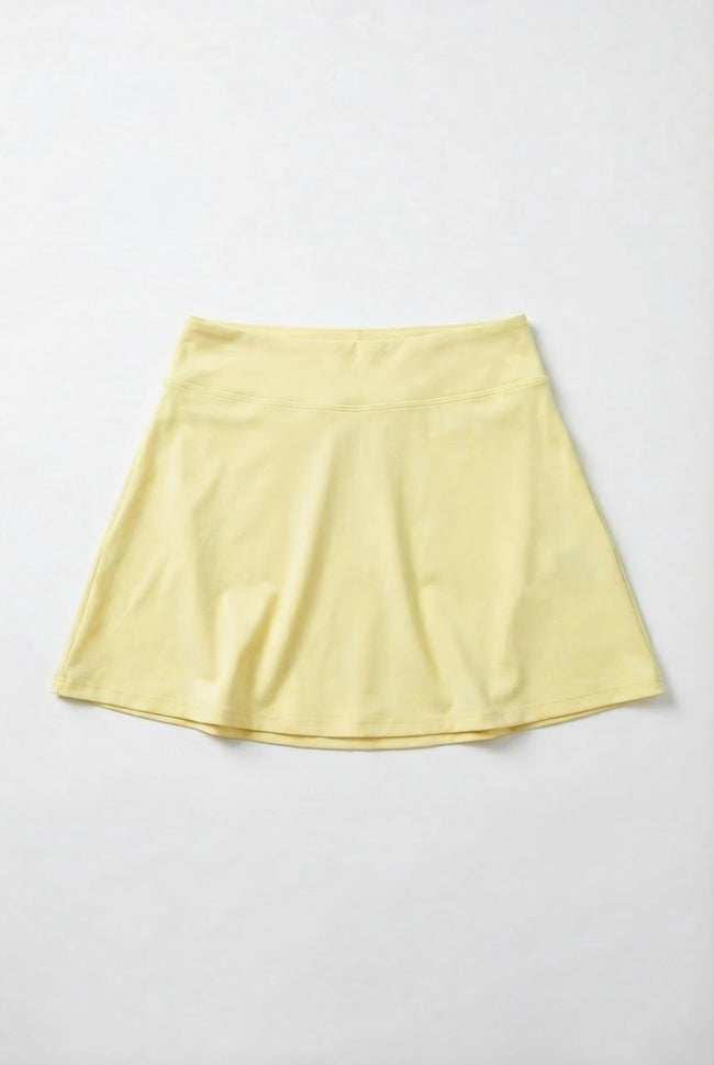 Yellow skirt on a light gray background