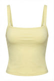 Yellow tank top with thin straps on a white background