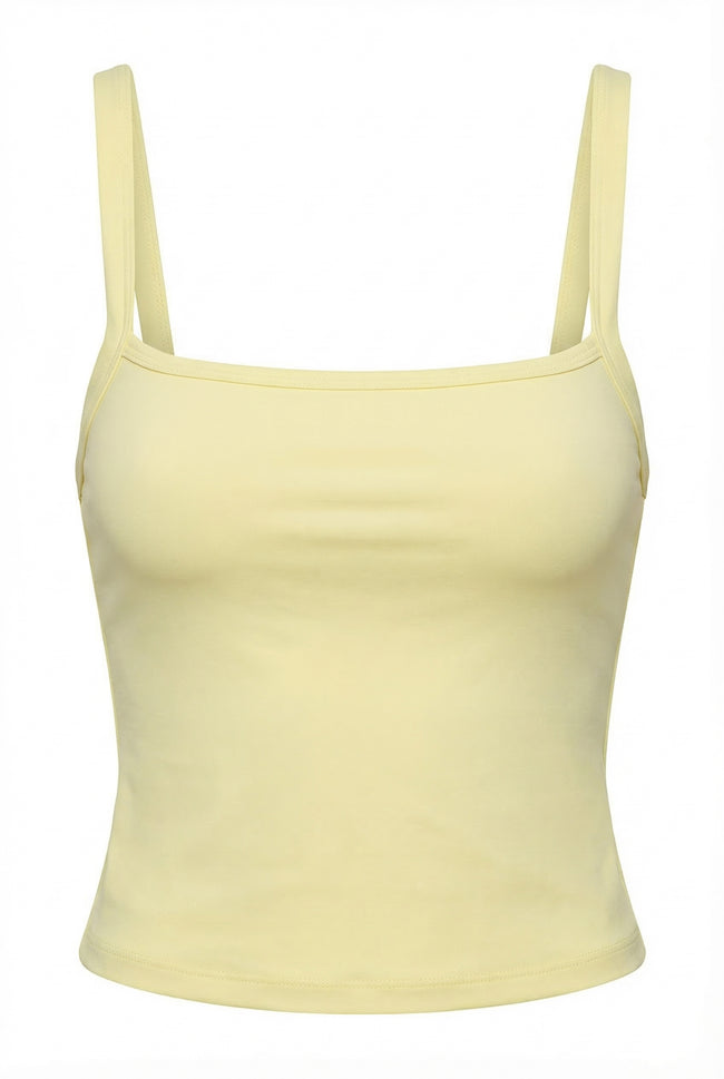 Yellow tank top with thin straps on a white background